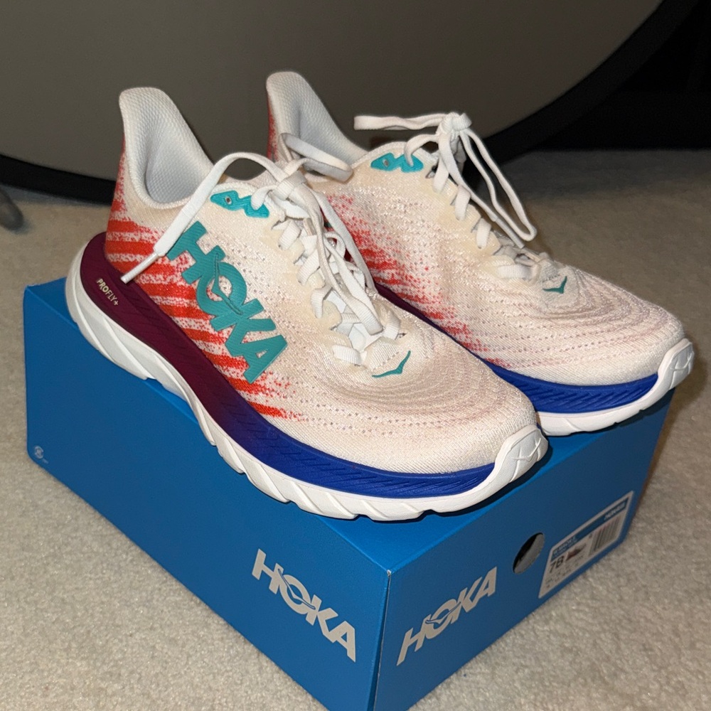 Hoka White and Red Athletic Shoes with Blue Logo